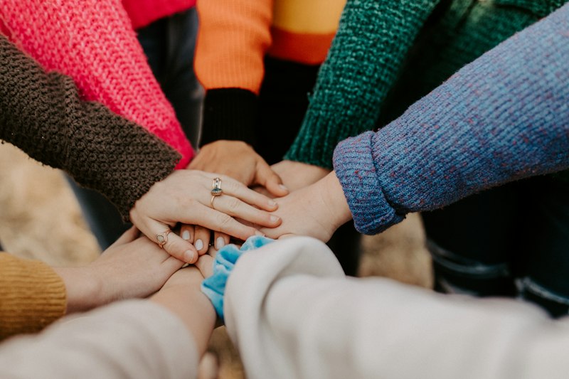Hands together community support